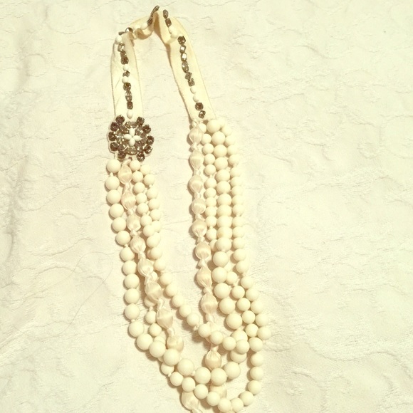 Multi strand Stella and Dot necklace.