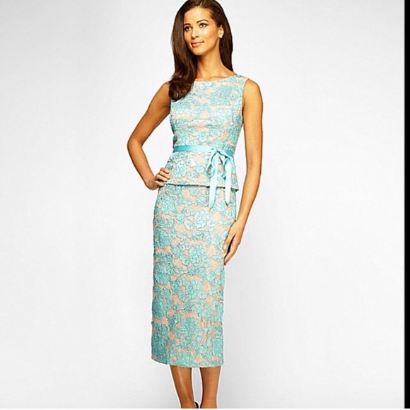 Brand new. Designer dress