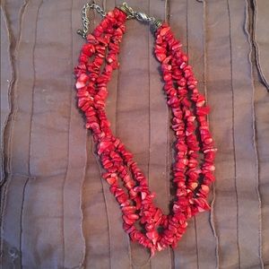 Red multi strand necklace