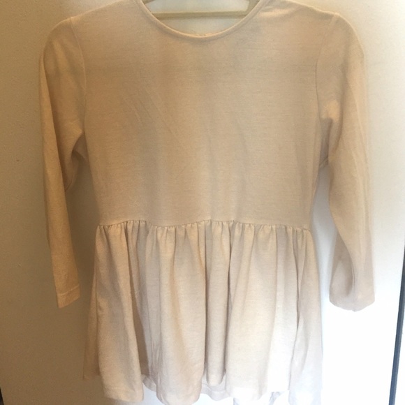 Ivory peplum top with 3/4 sleeves