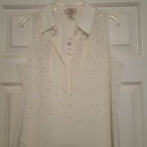 White sleeveless button down