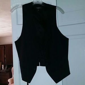 Black vest.