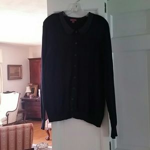 Peter Pan, navy blue cardigan.