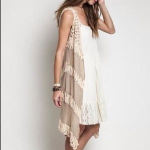 Vest with crochet detail. Super cute! Size small