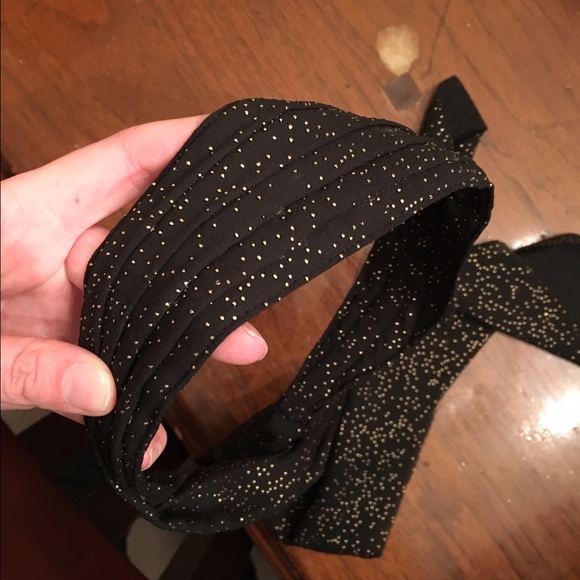 Anthropologie headband with black and gold dots