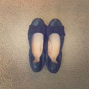 Tahiti black flats.