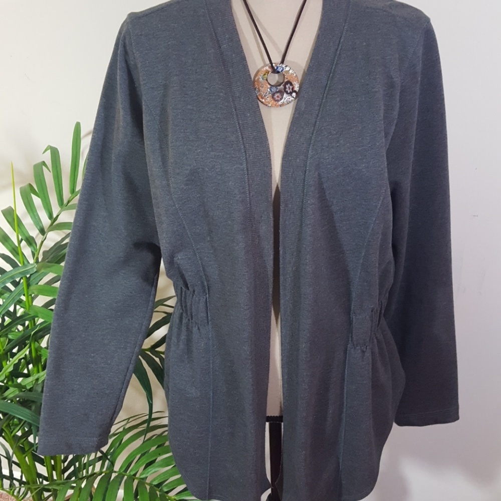 Perpetual Motion open grey jacket.