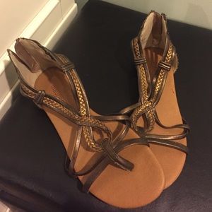 Brown and gold gladiator sandals