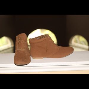 Tan suede lace-ups in a size 10