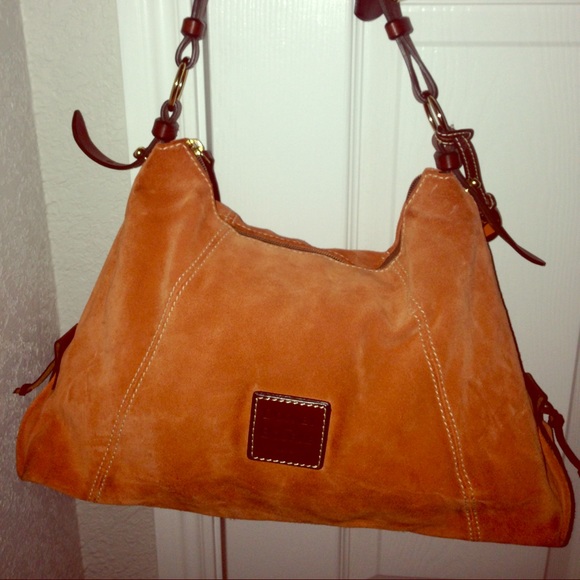 Dooney & Bourke orange & brown suede purse.