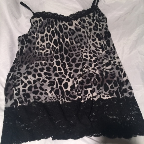 Lace trimmed animal print tank top.