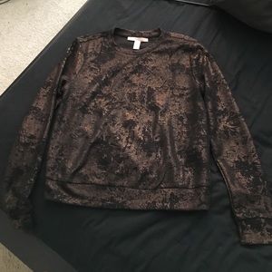 Cute, shiny crew neck sweater. Sz small.