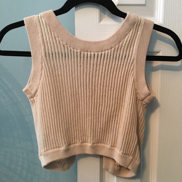 Never worn cream colored crop top size small.