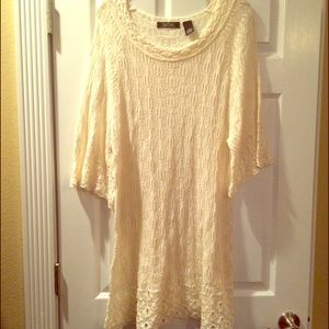 Cream colored lace dress/ top. Great with leggings
