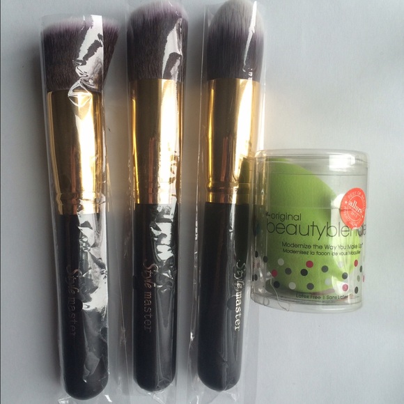 Beauty Blender and three face brushes