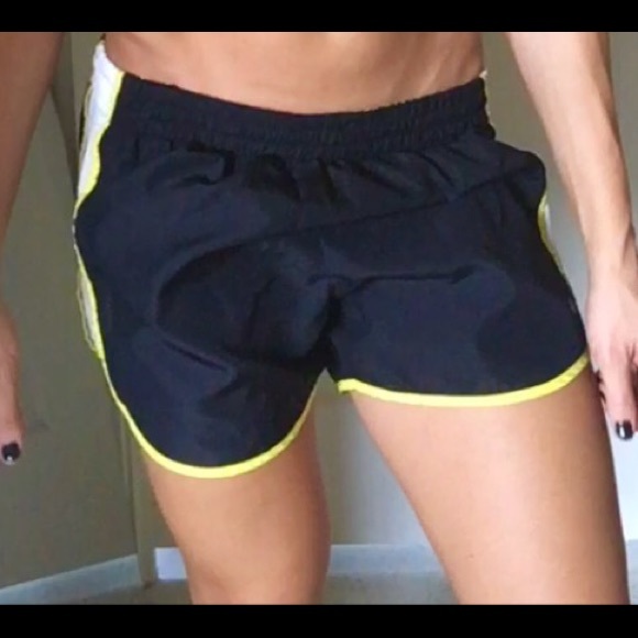 Black and yellow running short