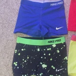 Blue then green and black splatter paint