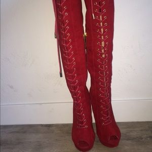 Thigh high lace up Red boots