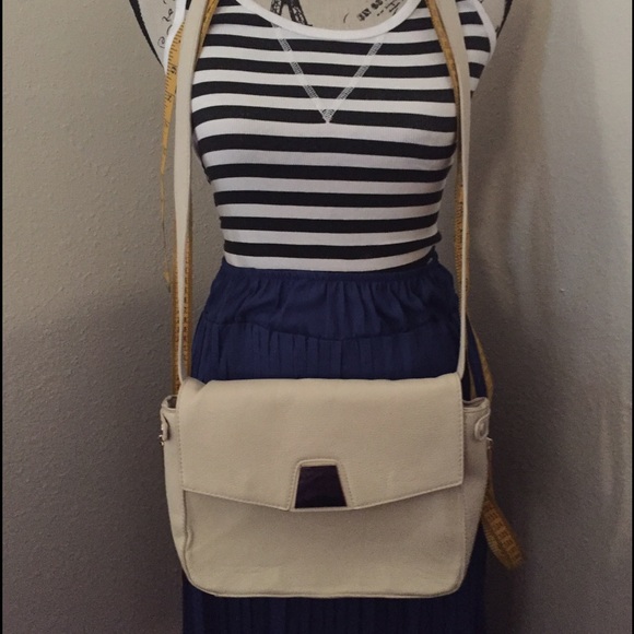 Trifold style cream/bone crossbody bag