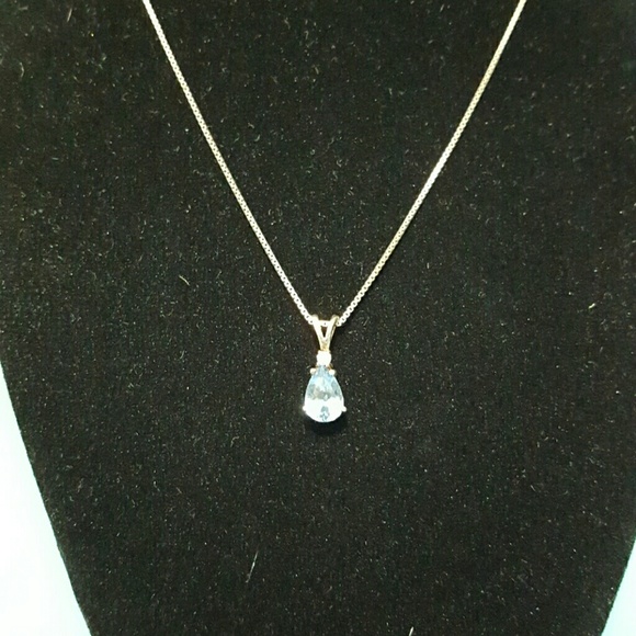 Aquamarine teardrop pendant with diamond accent