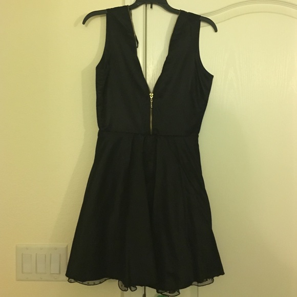 Black dress with gold zipper