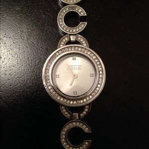Genuine Coach watch with swavoraski crystals.