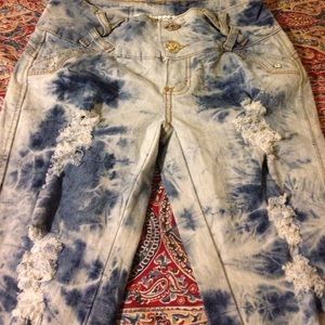Im selling a grey white blue jeans size 2