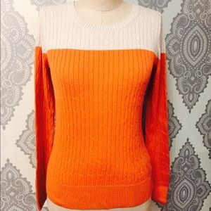 Cream and orange sweater