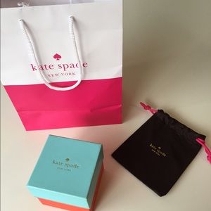 Kate Spade bag, watch box, and dust bag