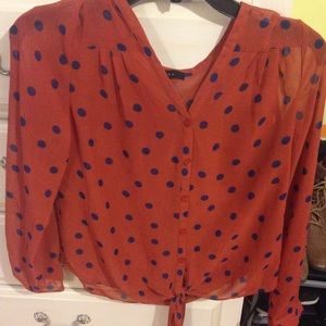 orange red and navy blue polka dotted button up