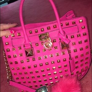 Pink stud MK hamilton