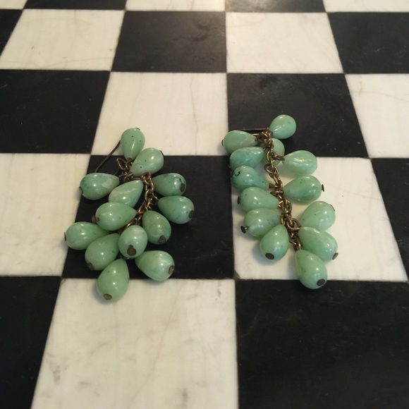 Green costume earrings