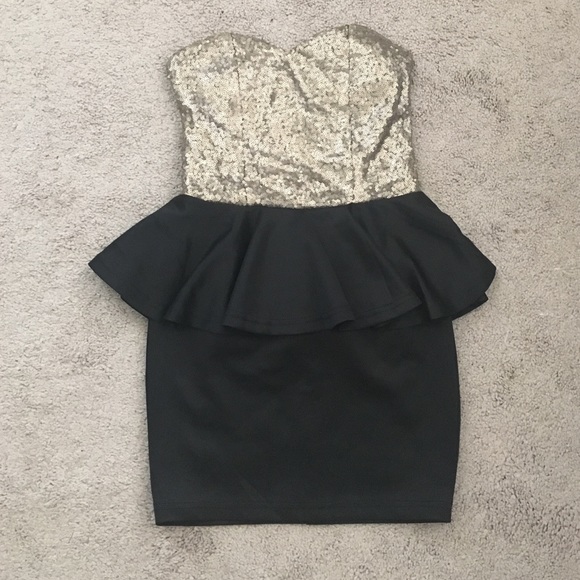 Gold sequin peplum open back mini dress
