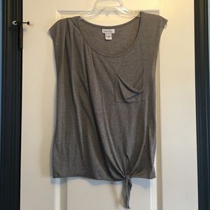 Gray shirt with pocket, and ties at the bottom