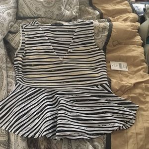 Black, white, and yellow peplum