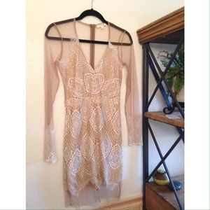 Luxxel medium sheer lace dress from Nasty Gal