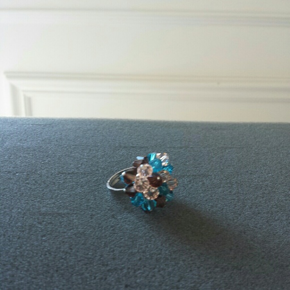 Silver jeweled ring