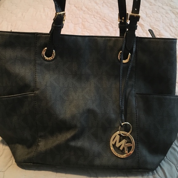 MK black purse never used