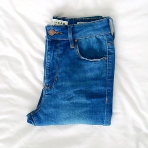 High waisted medium wash jeans