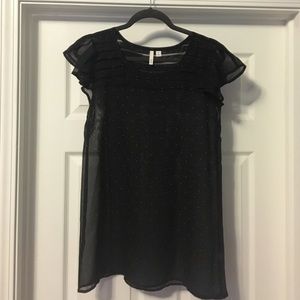 Black shirt white polka dots and ruffles