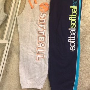 two pairs of softball sweatpants
