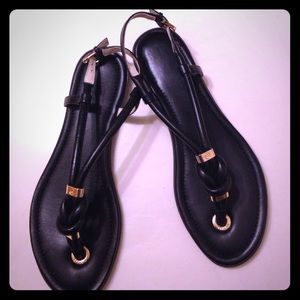 Michael Kors size 9 Black sandals with gold accent
