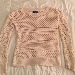 A cream colored sweater