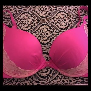 Hot pink Victoria's Secret "plunge" bra.