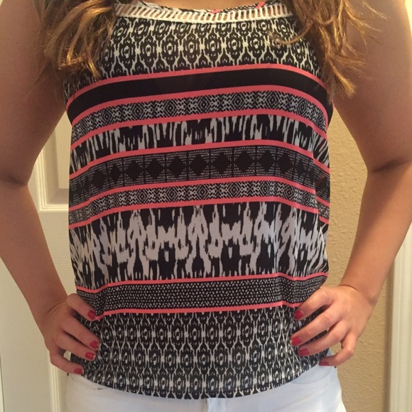 Pink and black patterened top.