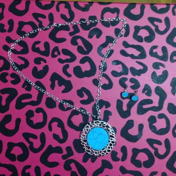 Silver necklace & earrings with blue stone
