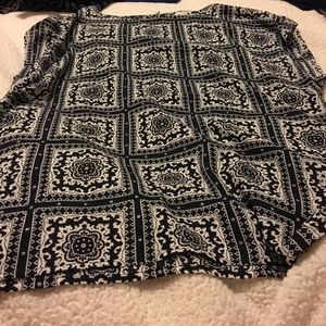 Short sleeve blouse.  Button closure