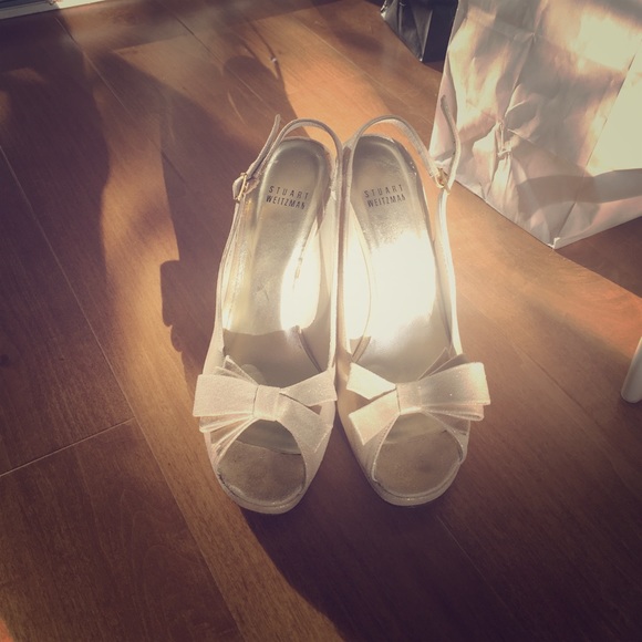 Stuart Weitzman gold bow heels about 3 1/2 inches