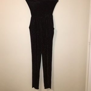 Tight body jumper with gold shimmers. Never worn