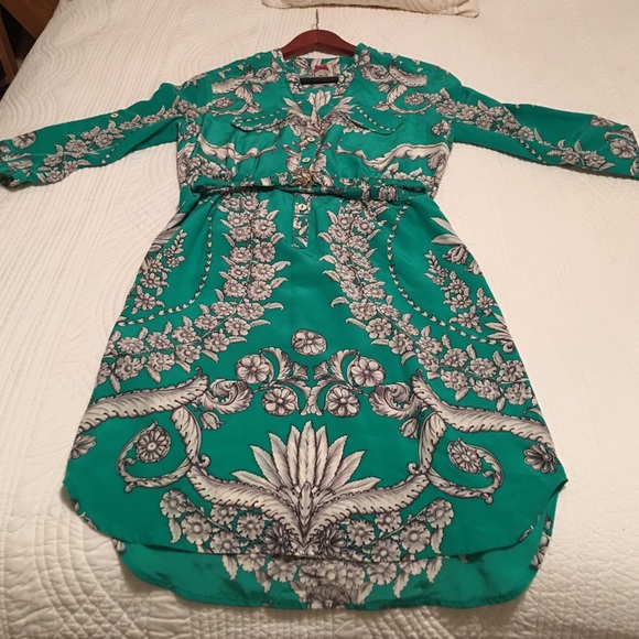 Green silk dress with elegant pattern